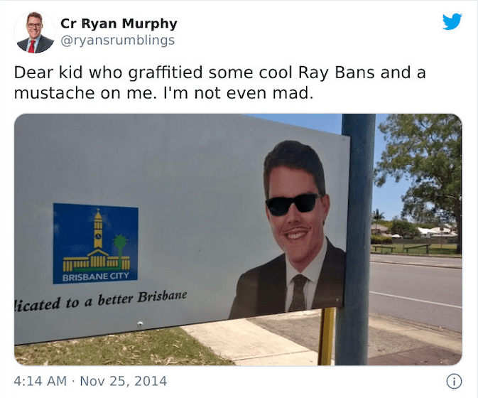 1. A man's face on a poster. 